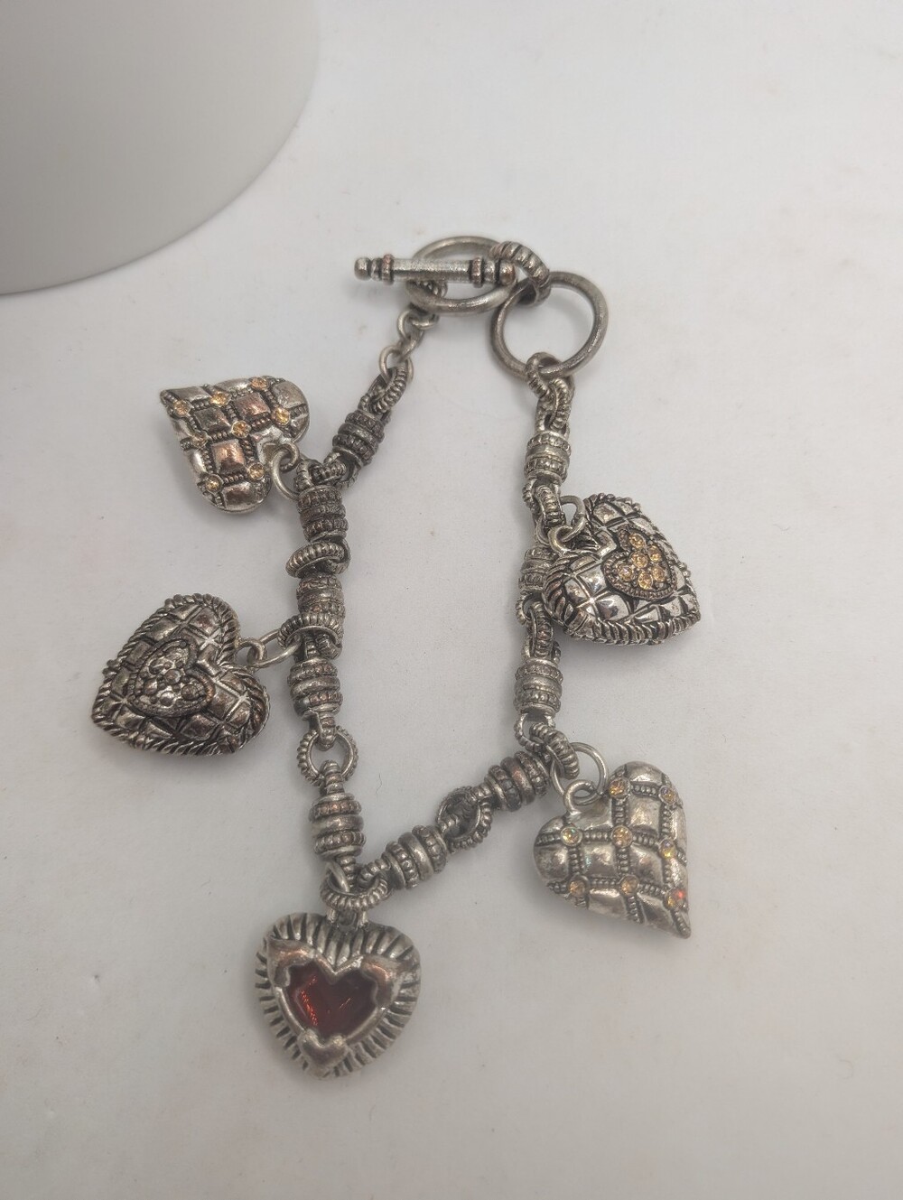 Chunky Silver-Tone Heart Charm Bracelet with Gold Accent Hearts